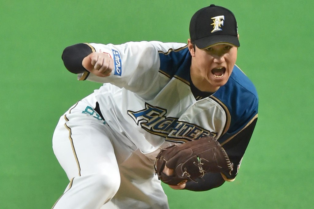 The Nippon Hma Fighters' clincher Shohei Otani roars during the ninth inning of the final stage of the Pacific League Climax Series against the Fukuoka SoftBank Hawks at Sapporo dome on Oct. 16, 2016. 