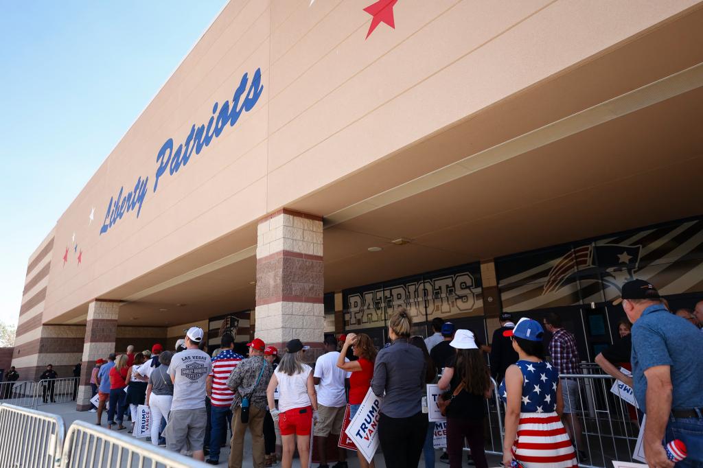 People wait to get into a campaign event for US Senator and 2024 Republican vice presidential candidate J.D. Vance at Liberty High School on July 30, 2024, in Henderson, Nevada. 