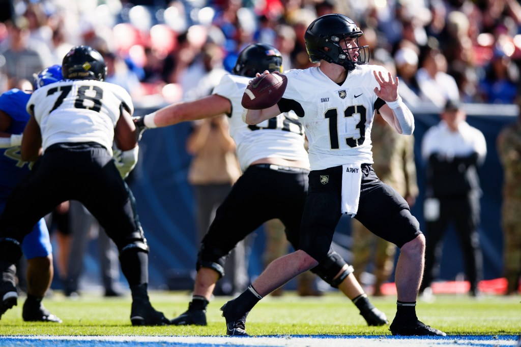 Quarterback Bryson Daily #13 of the Army Black Knights throws a pass during the second quarter against the Air Force Falcons at Empower Field at Mile High on November 4, 2023 in Denver, Colorado.