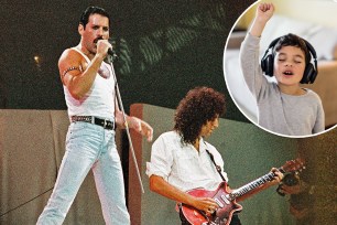 Freddy Mercury performing with Queen