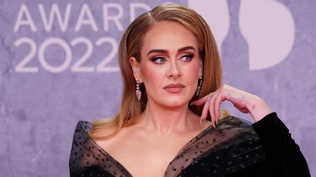 Adele sporting a diamond ring on the red carpet at the BRIT Awards in London on February 8, 2022.