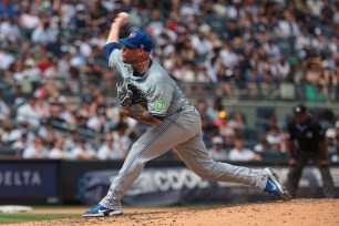 Toronto Blue Jays starting pitcher Yariel Rodriguez (29) delivers a pitch during the fourth inning against the New York Yankees at Yankee Stadium.