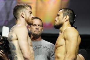 Cory Sandhagen and Umar Nurmagomedov facing off during UFC Fight Night ceremonial weigh-in at Etihad Arena in Abu Dhabi