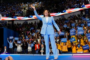 Vice President Kamala Harris waving to the crowd at a campaign rally in Atlanta, July 2024