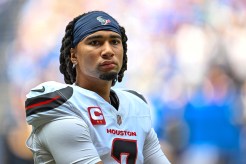 Texans quarterback C.J. Stroud stands on the sidelines before the Texans' 29-27 Week 1 win over the Colts at Lucas Oil Stadium.