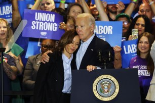 Democratic presidential nominee, Vice President Kamala Harris is embraced by President Joe Biden during a campaign event at IBEW Local Union #5 on September 02, 2024 in Pittsburgh, Pennsylvania.