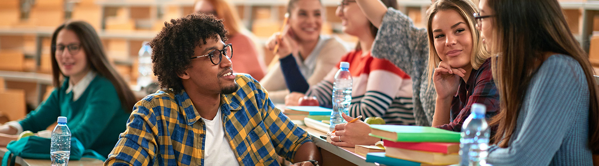 Students talking in a lecture hall