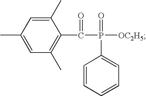 Figure US09594319-20170314-C00004