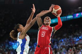 A'Ja Wilson #9 of Team United States shoots over Marieme Badiane #22 of Team France during the Women's Gold Medal game between Team France and Team United States on day sixteen of the Olympic Games Paris 2024 at Bercy Arena on August 11, 2024 in Paris, France. 