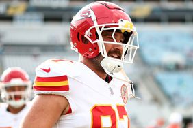 Travis Kelce #87 of the Kansas City Chiefs smiles prior to an NFL preseason football game against the Jacksonville Jaguars at EverBank Stadium on August 10, 2024 in Jacksonville, Florida.