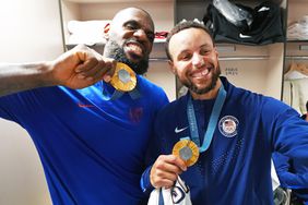 LeBron James #6 and Stephen Curry #4 of Team USA pose for the camera after the Men's Gold Medal Game on August 10, 2024 at the AccorHotels Arena in Paris, France. 