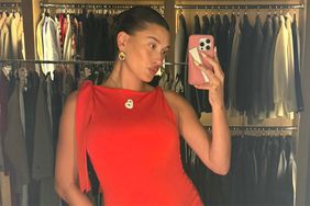 Pregnant Hailey Bieber Shows off Growing Baby Bump in Red Hot Mini Dress