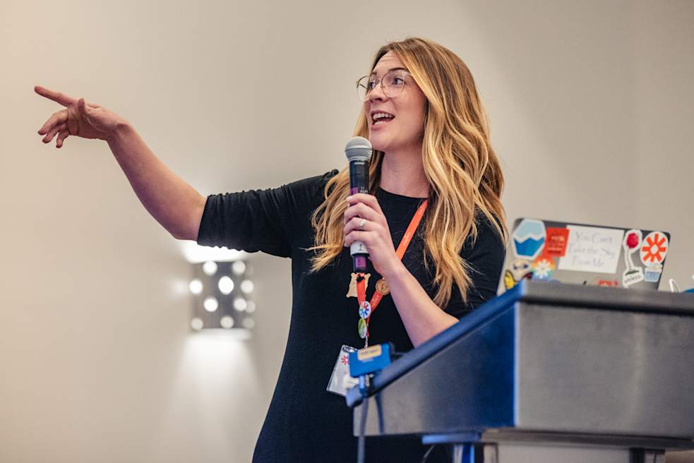 A Zapier employee speaking at a podium