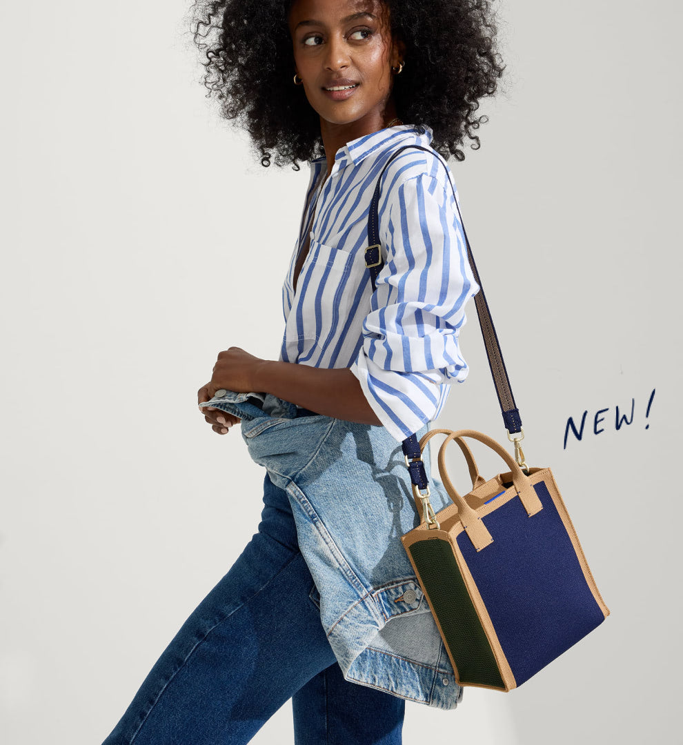 a female model wearing the Petite Classic Tote in Mallard Blue