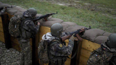 Ukrainian soldiers train in a military camp in eastern France, on 9 October 2024, the day of a visit by French President Emmanuel Macron.