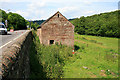 SK3354 : Old Barn by the A6 by David Lally