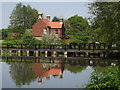 TQ0557 : Weir by Walsham Lock by Colin Smith