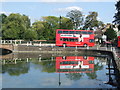 TQ2764 : Bus reflection, Carshalton ponds by Malc McDonald