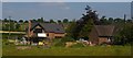 SJ4309 : House under construction, Pound Lane, Hanwood, from the railway by Christopher Hilton