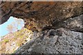 NM8944 : Underneath the arch, Clach Toll by Jim Barton