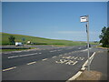 NT9756 : Northumberland Public Transport : A1 Southbound Bus Stop At Marshall Meadows Road-End (View NW) by Richard West