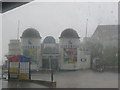 SZ0890 : Bournemouth: the Oceanarium in heavy rain by Chris Downer