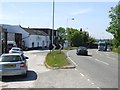 SJ9385 : Shops next to the busy A6 by Brian Abbott