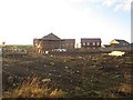 NU1033 : Houses under construction, Belford by Graham Robson