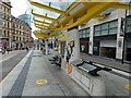 SJ8398 : Exchange Square tram stop with Daffy Duck by Gerald England