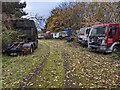 SJ5004 : Disused vehicles / trucks stored at former Condover airfield by TCExplorer