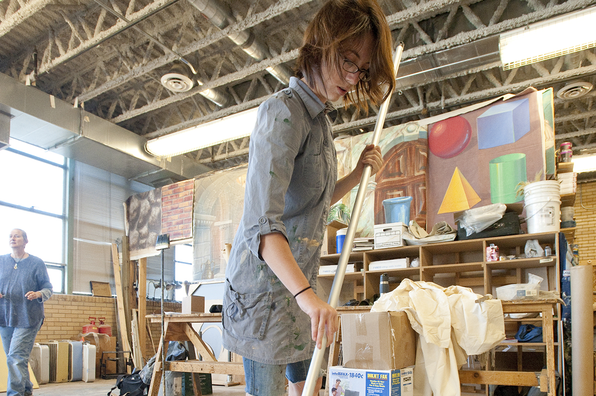 Student pictured working in the paint shop