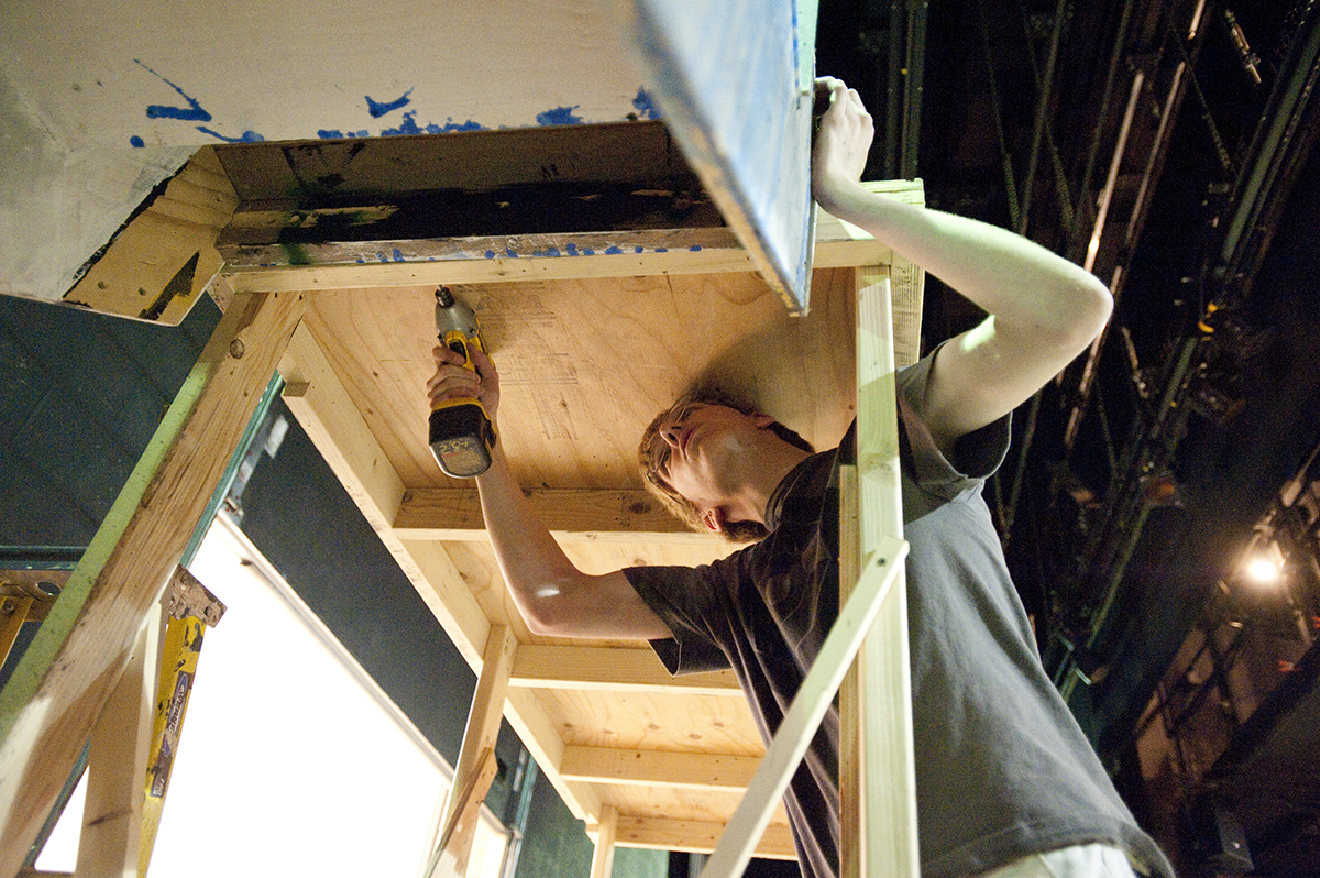 CSU student pictured working in the scene shop