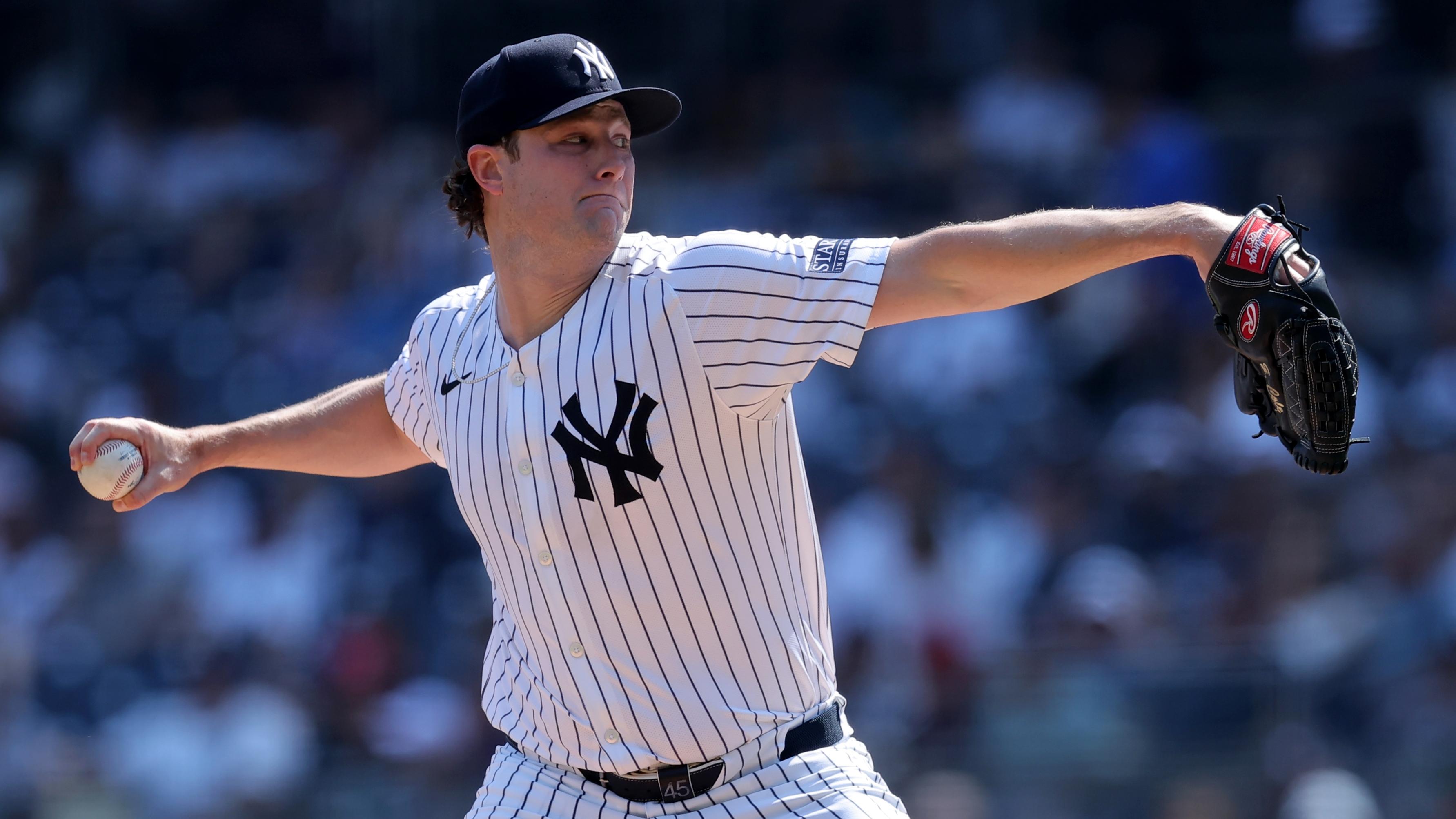 New York Yankees starting pitcher Gerrit Cole (45) pitches against the Boston Red Sox during the first inning at Yankee Stadium.