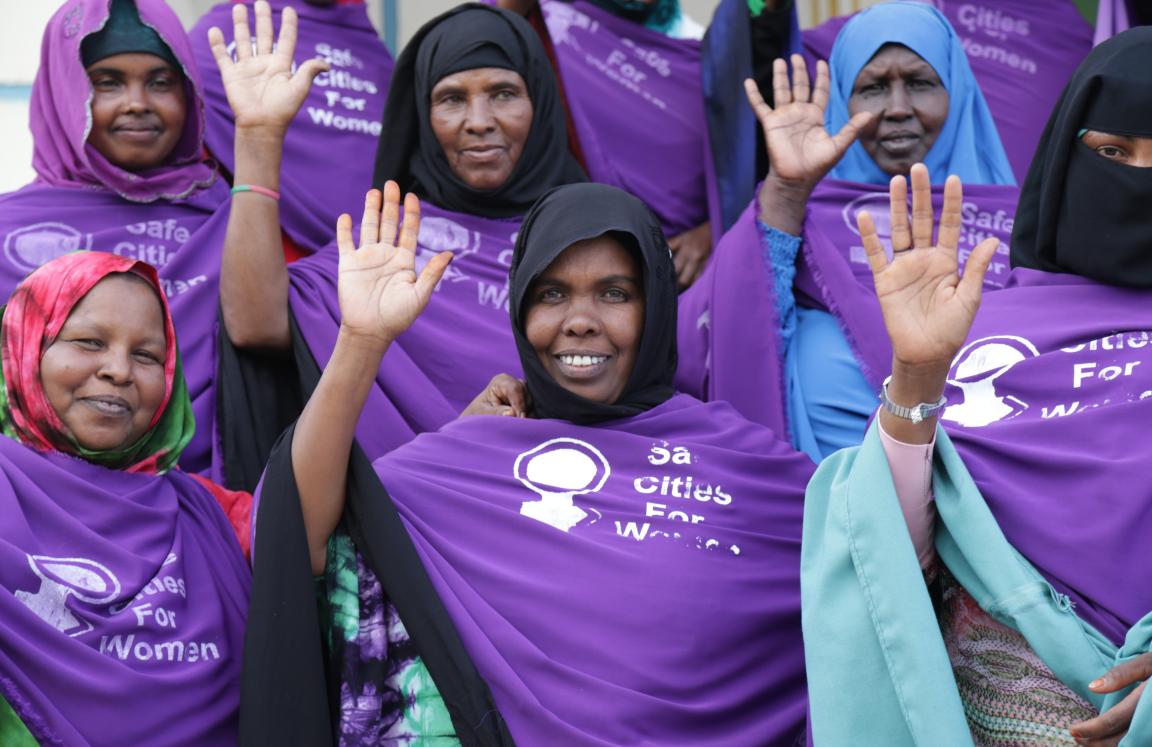 Women campaigning together for equal access to the cities