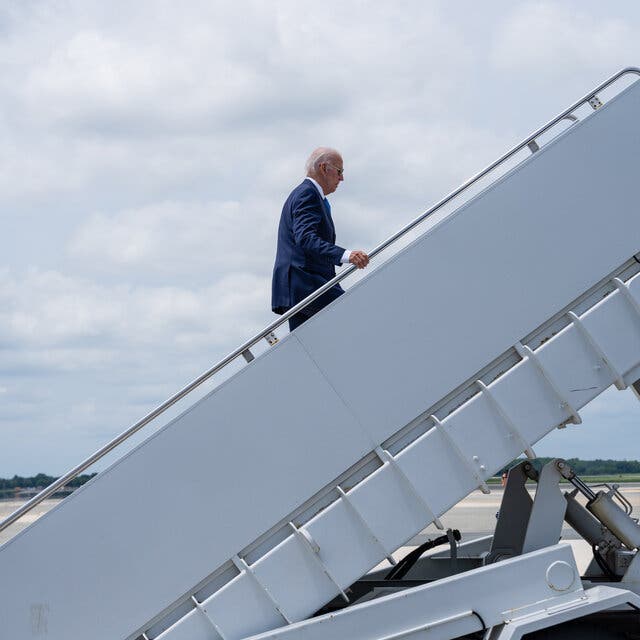 President Joe Biden boards Air Force One as he travels back to Washington, D.C. at Dover Air Force Base in Delaware on Tuesday.