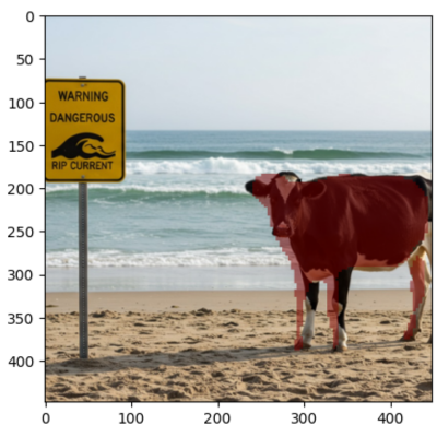 A highlighted cow standing on the beach next to a yellow sign that reads 'Warning Dangerous Rip Current' with an illustration of a large wave breaking.