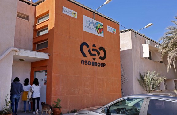 The NSO Group company logo is displayed on a wall of a building next to one of their branches in the southern Israeli Arava valley near Sapir community centre on February 8, 2022.