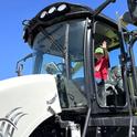 A Butte County youngster is all smiles as he gets an up-close look at a harvester during Ricetastic Day at Schohr Ranch. Photo by Mike Hsu