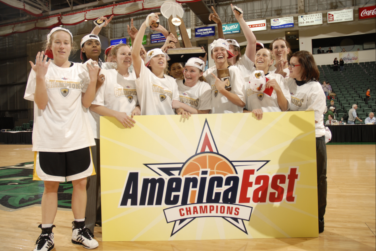 women's basketball team celebrating