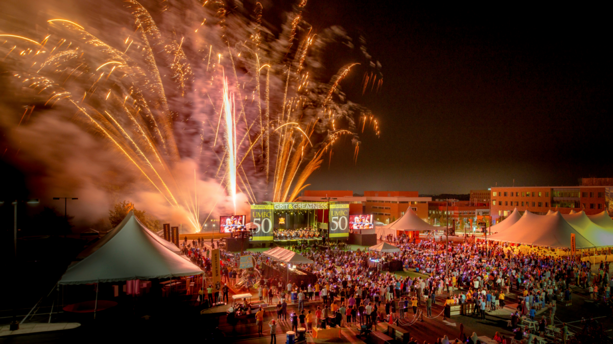 fireworks above a campus celebration