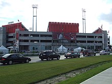 Exterior of red and white concrete multi-storey building