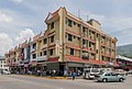 Row of contemporary shophouses in Tenom, Malaysia