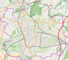 Mapa konturowa Łodzi, blisko centrum na lewo znajduje się punkt z opisem „Atlas Arena”