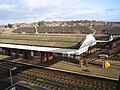 St Denys railway station platforms, canopies and homes and gardens in the hilly western part of Portswood and Bevois Mount beyond