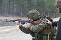 A marine fires an AK-47