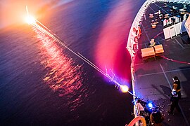 A nighttime live-fire exercise with a .50 caliber machine gun aboard the cutter Stratton