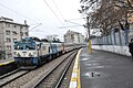 An unidentified E43000 leads the Boğaziçi Express through Kartal station.