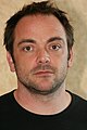 Mark Sheppard interpreta Romo Lampkin.