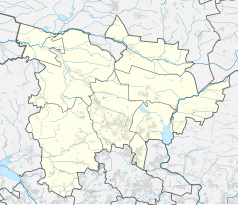 Mapa konturowa powiatu tarnogórskiego, blisko centrum na lewo znajduje się punkt z opisem „Kopanina”