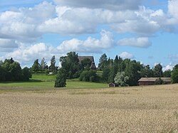 Ruskon kirkonkylää nähtynä Vahdontieltä kaakosta.